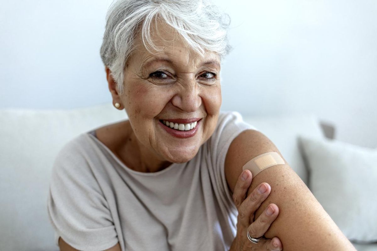 Elderly lady getting immunization