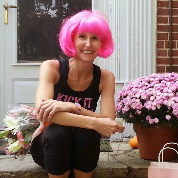 Erica, in one of the many colored wigs she wore during treatment