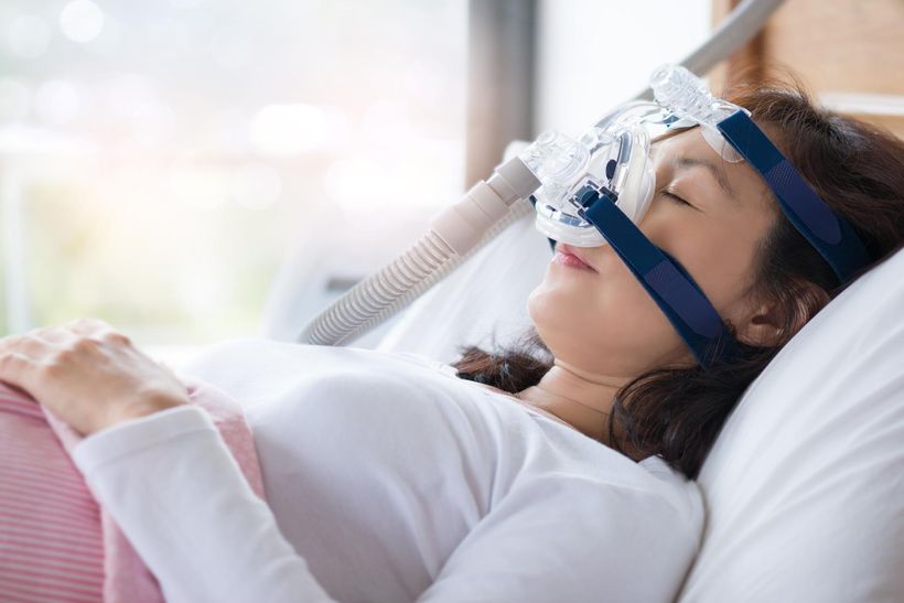 Woman and cpap mask