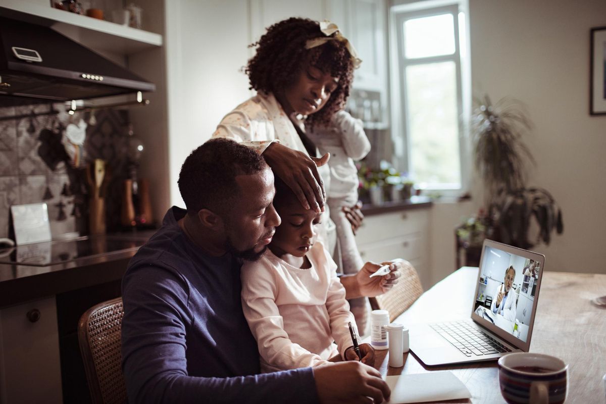 Family Consulting remotely with their Doctor