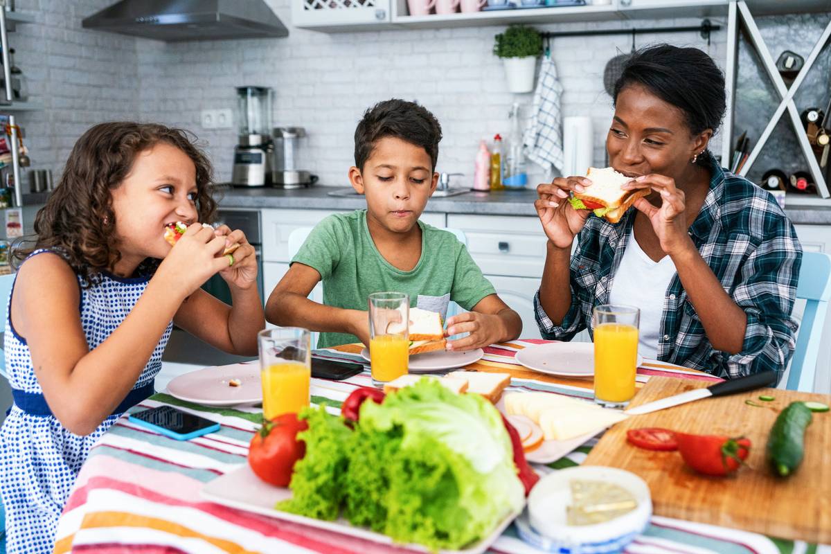 family eating healthy and tasty sandwiches