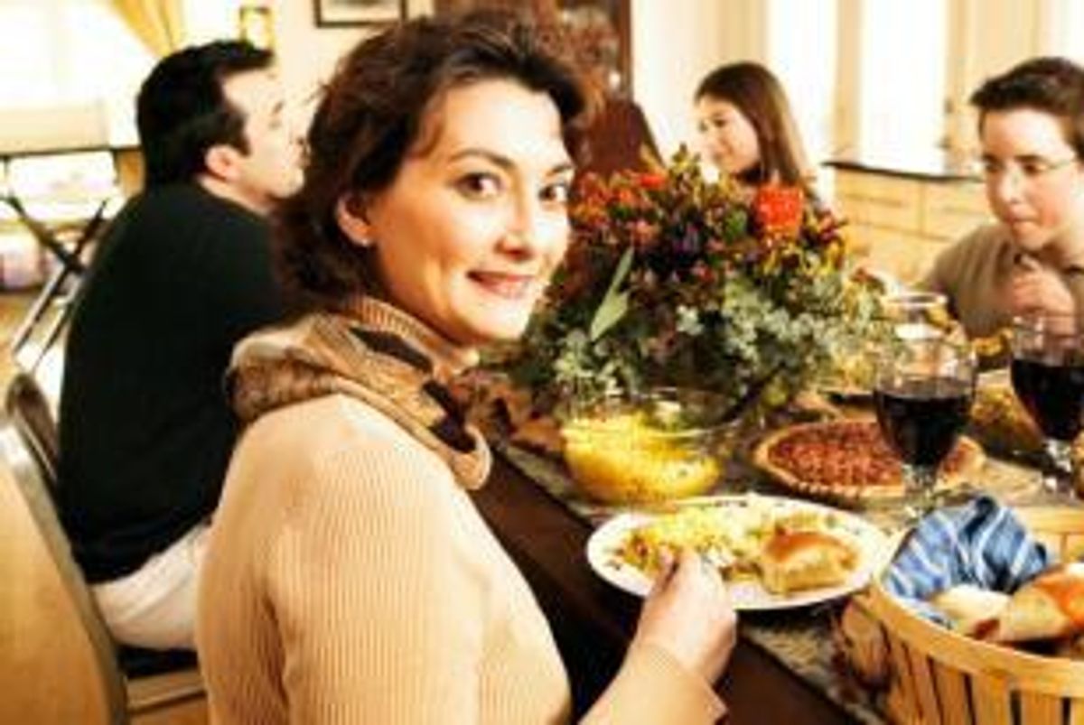 family eating holiday dinner