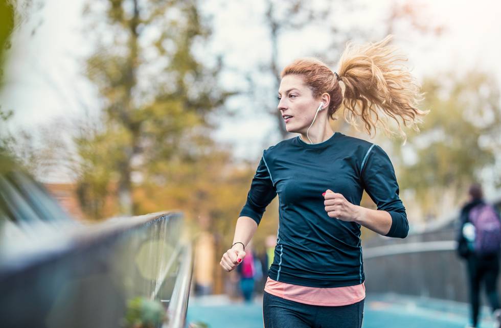 Female Athlete Running Outdoors before breakfast