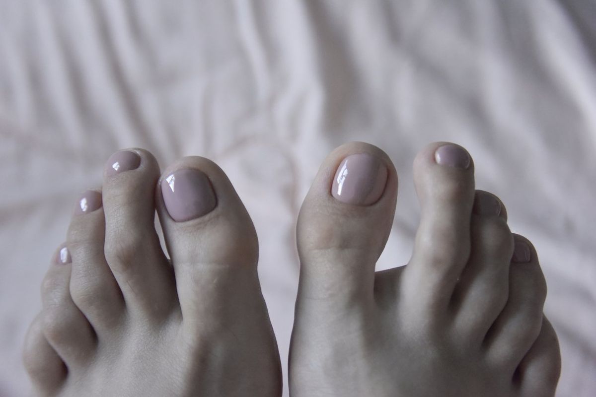 Female toes with fresh pedicure