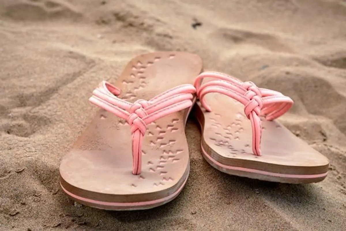 flip flops in the sand