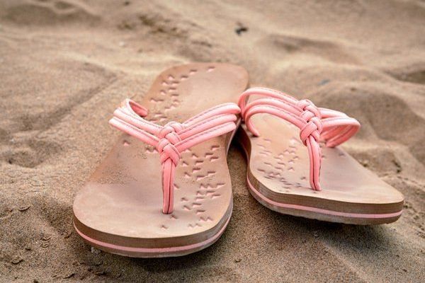 flip flops in the sand