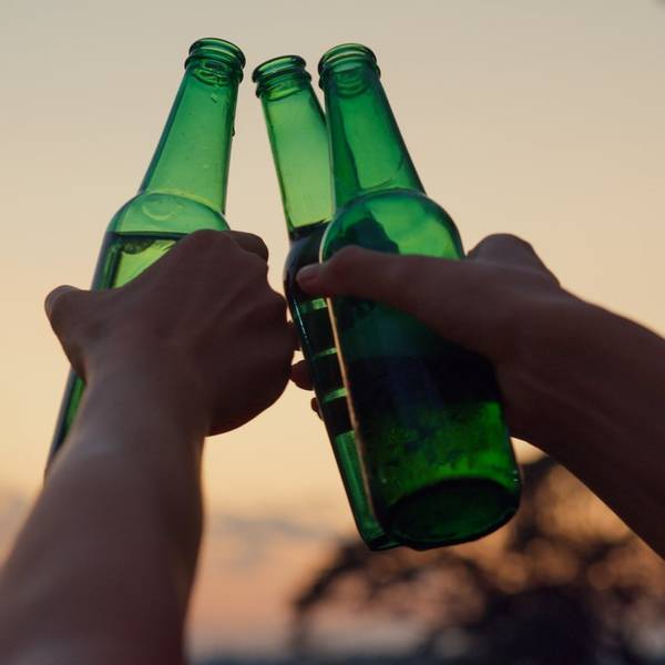 friends having fun, drinking bottled beer together