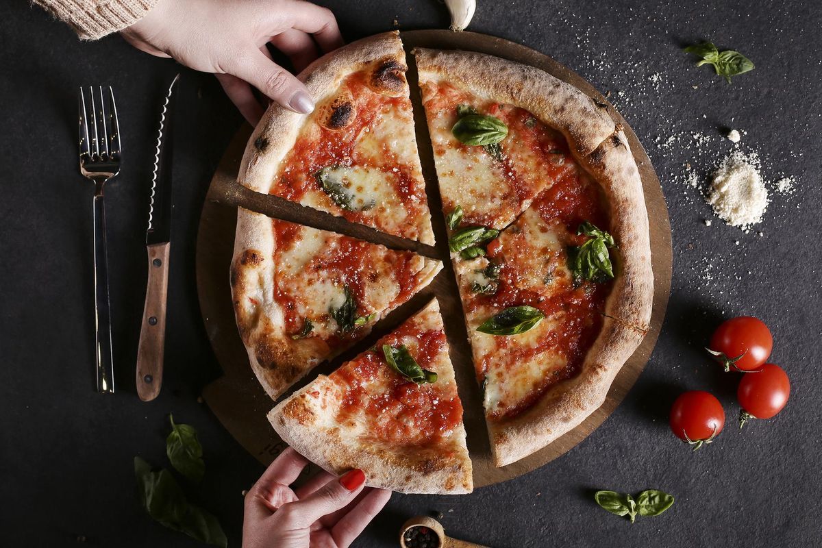 Friends sharing a pizza