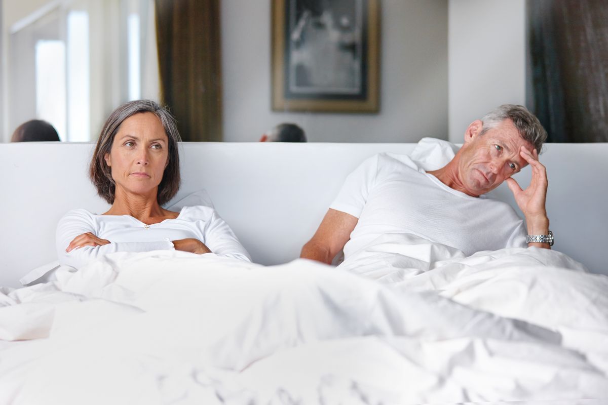 frustrated couple in bed
