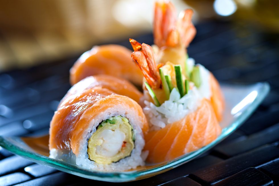futomaki sushi with salmon, prawn tempura and cucumber