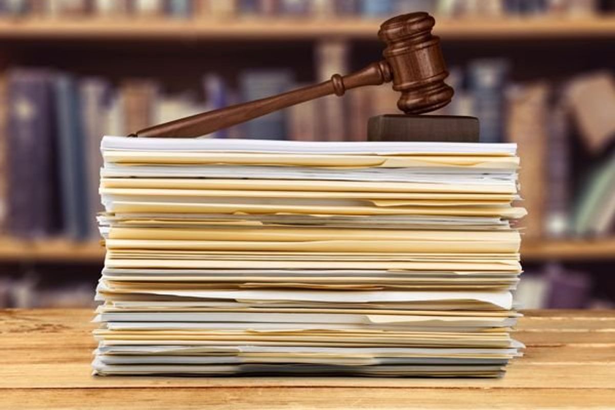 gavel on top of folders