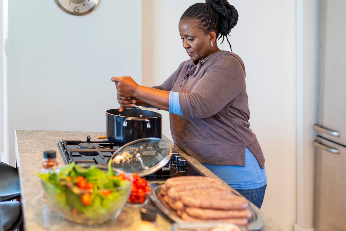 Grandmother Preparing Food in the Kitchen