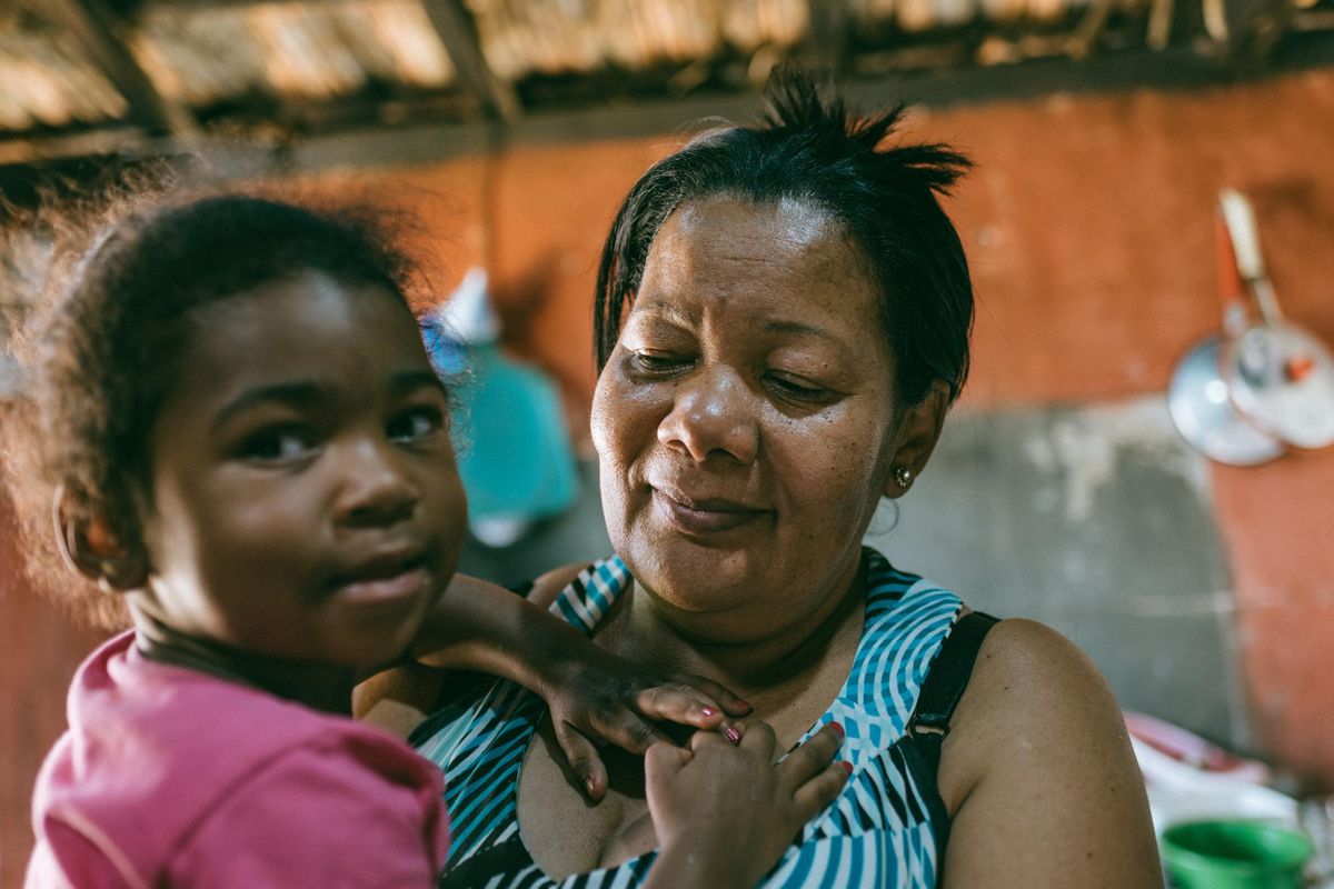 Grandmother with granddaughter on her lap