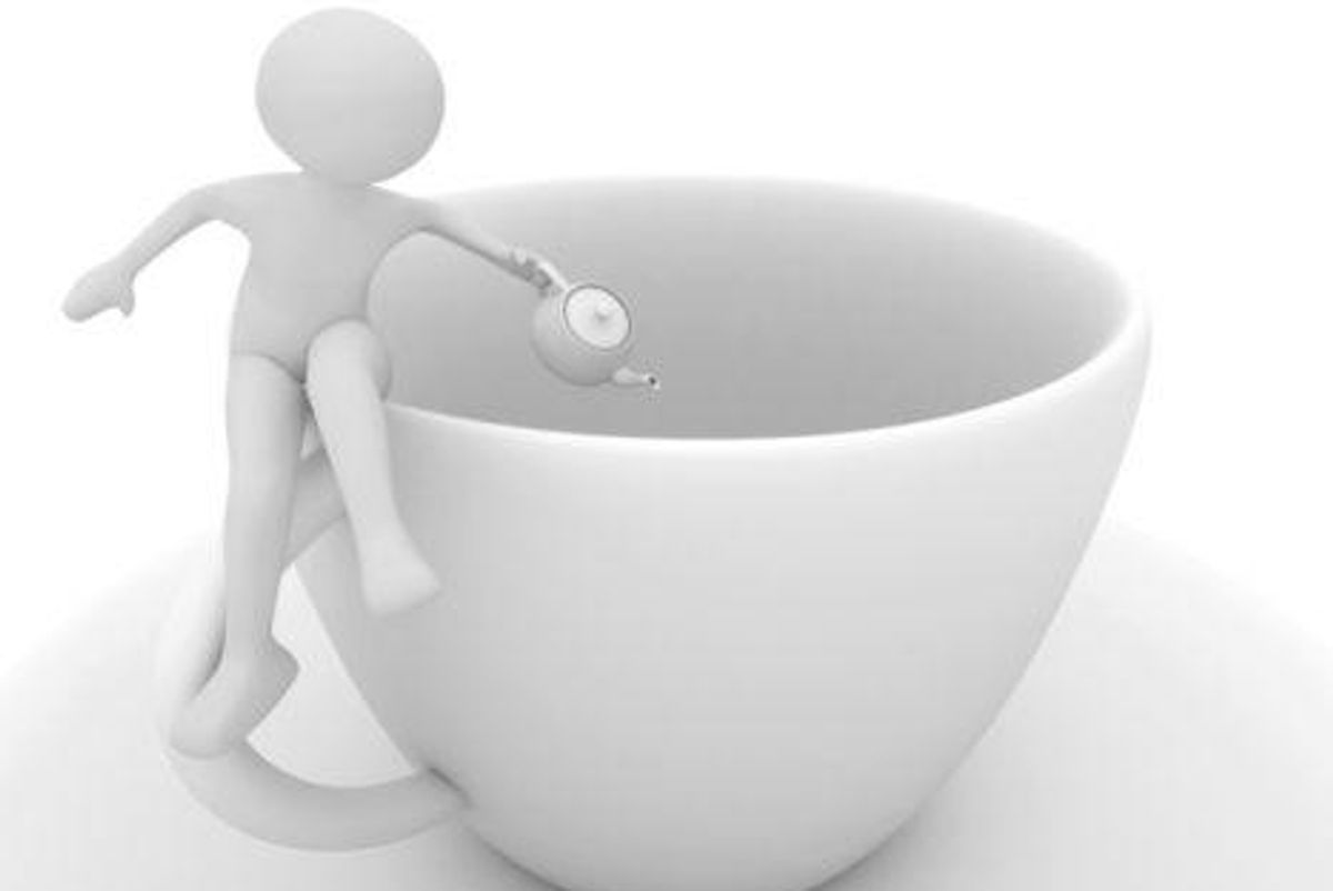 graphic of figure sitting on a coffee cup
