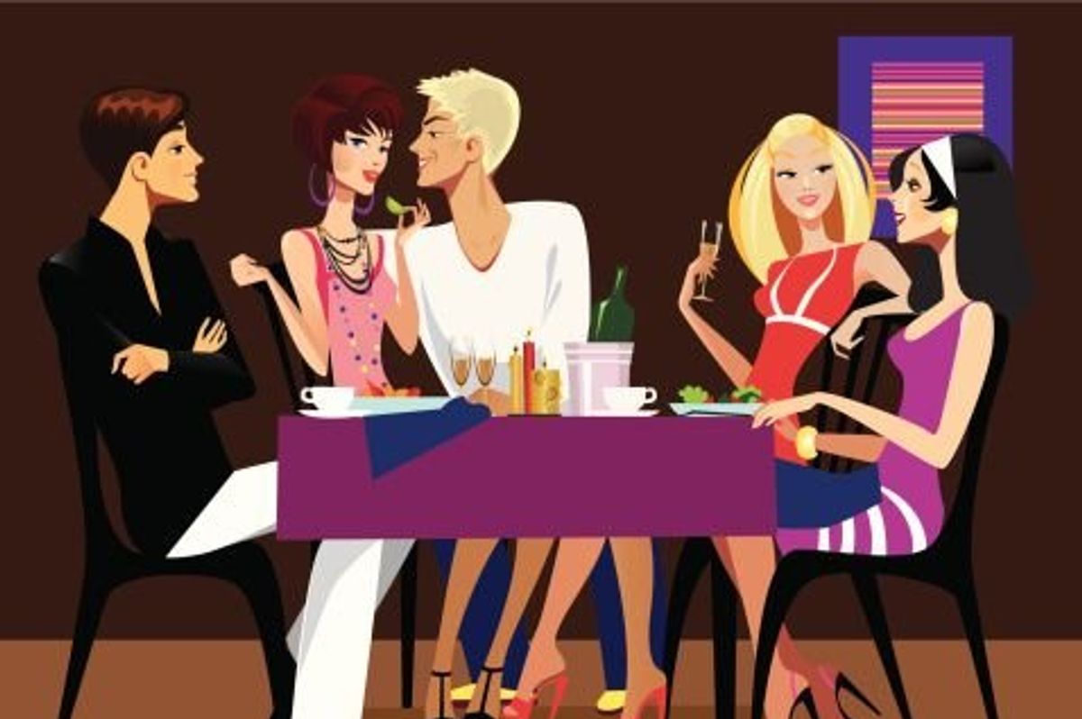 group of friends eating dinner at a restaurant