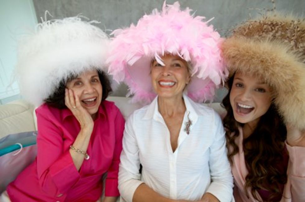 group of women wearing hats