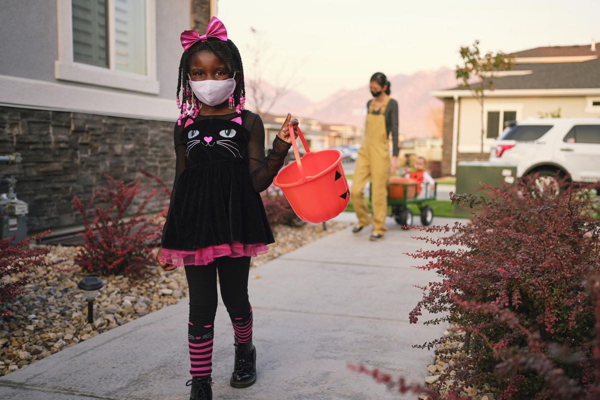 Halloween Children Trick or Treating Wearing Facemasks