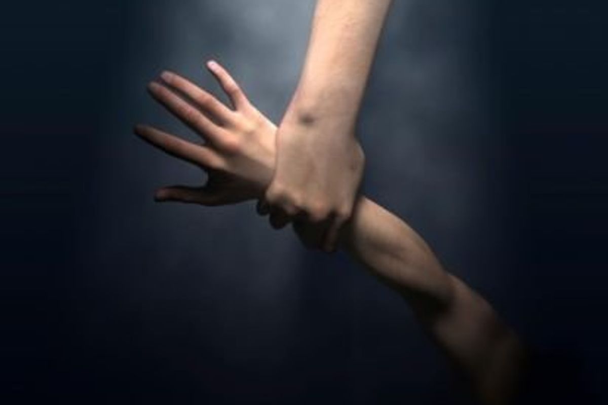 hand grabbing an arm