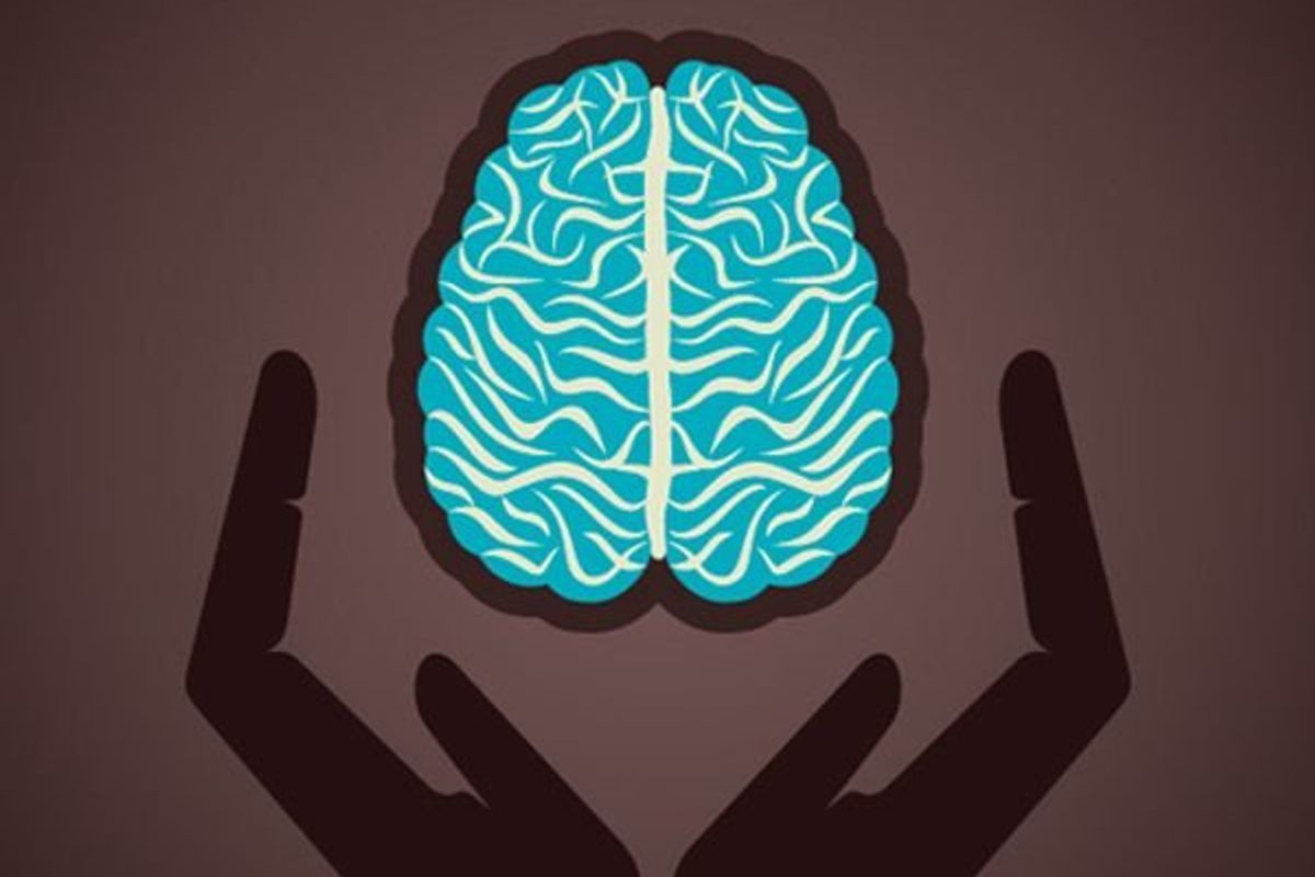 hands holding a brain