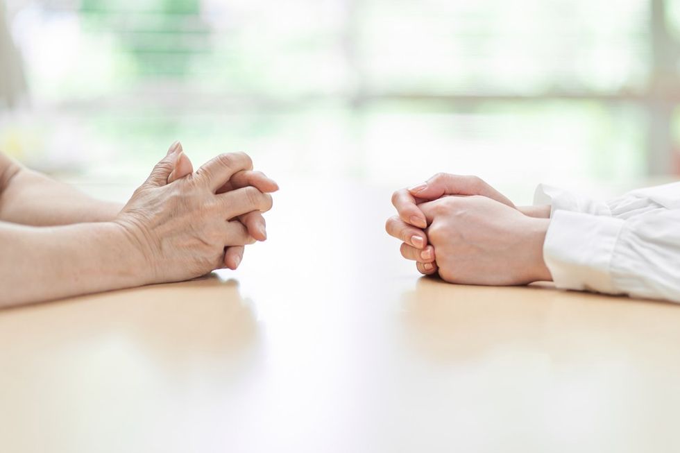 Hands of young and old women