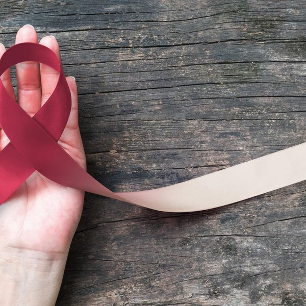 Head and neck cancer awareness with burgundy ivory color ribbon
