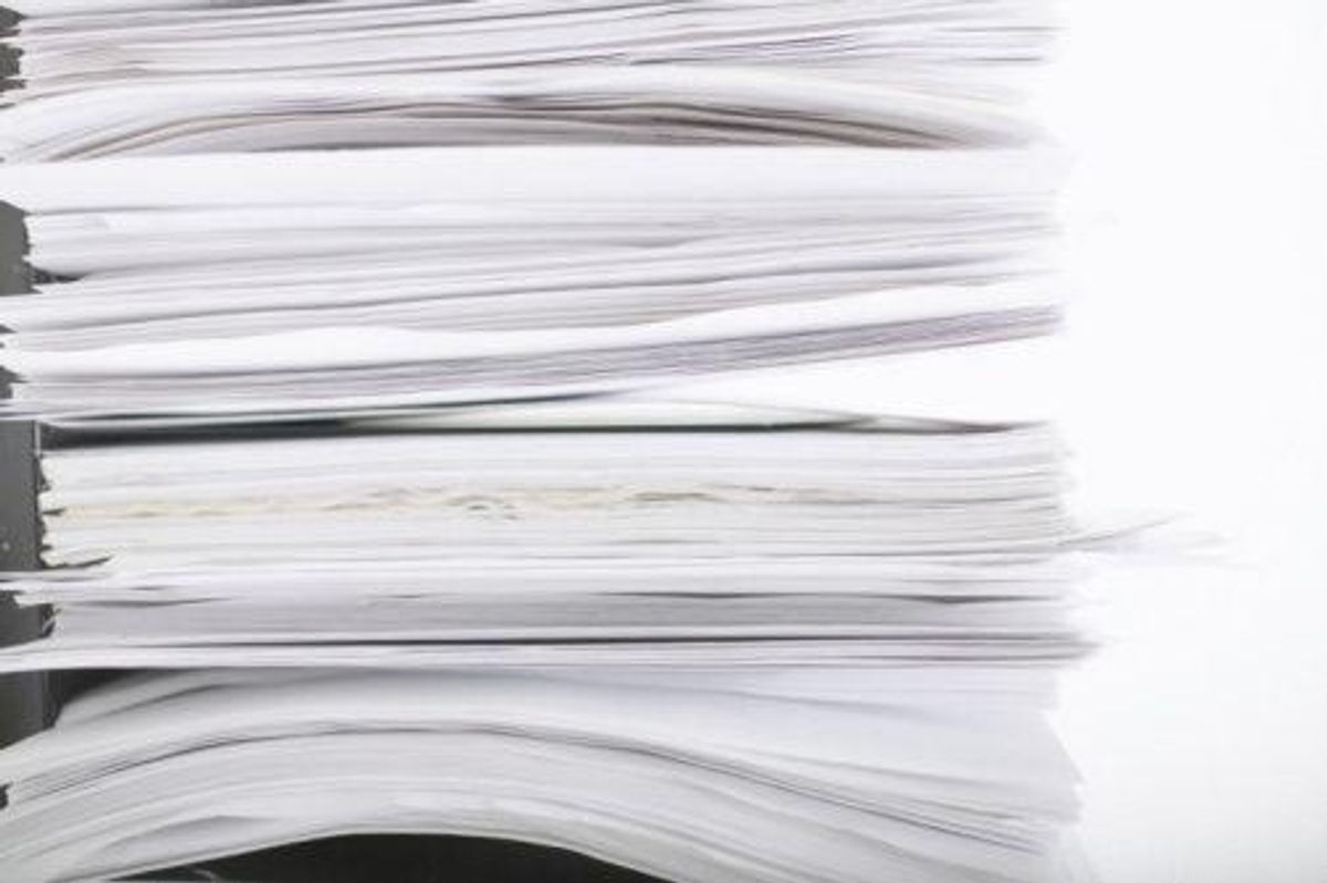 health care reform, stack of papers