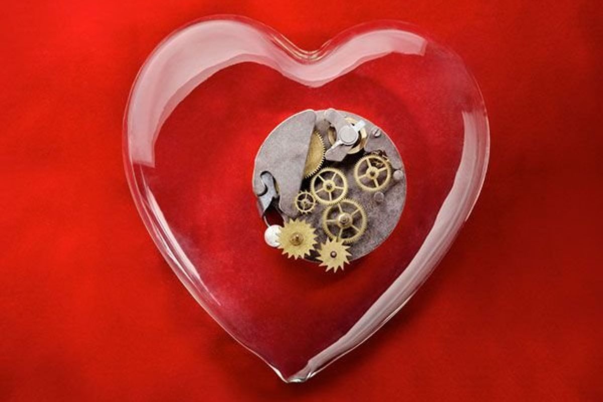 heart with mechanical cogs inside