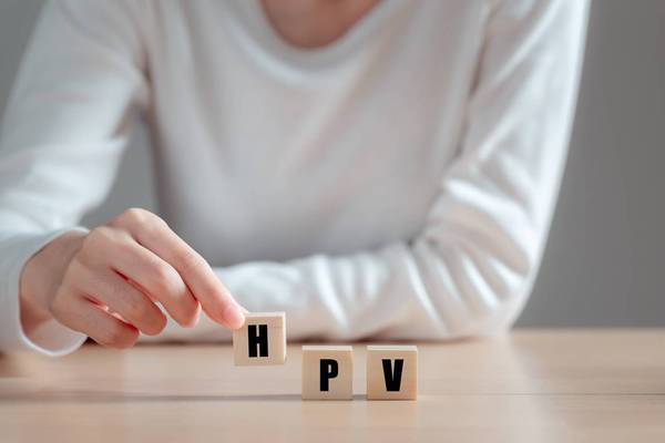 HPV (Human Papillomavirus) acronym on wood block