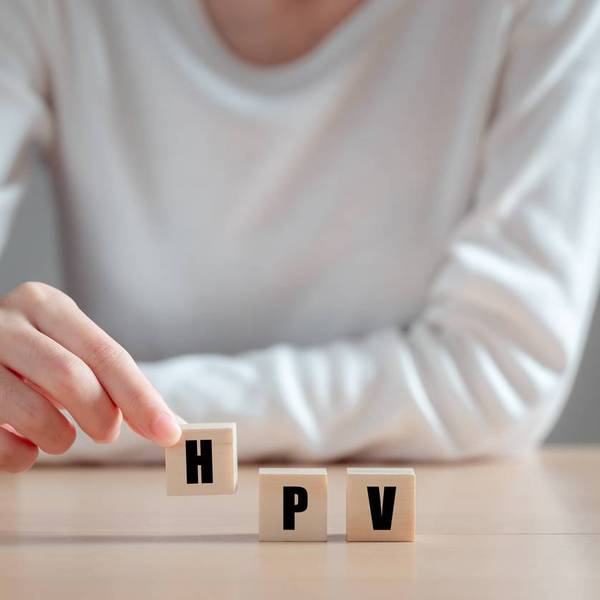 HPV (Human Papillomavirus) acronym on wood block