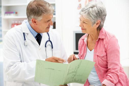 woman speaking with a doctor