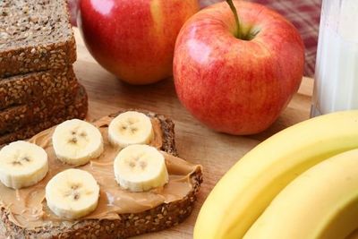 healthy snacks - apples, peanut butter, bananas