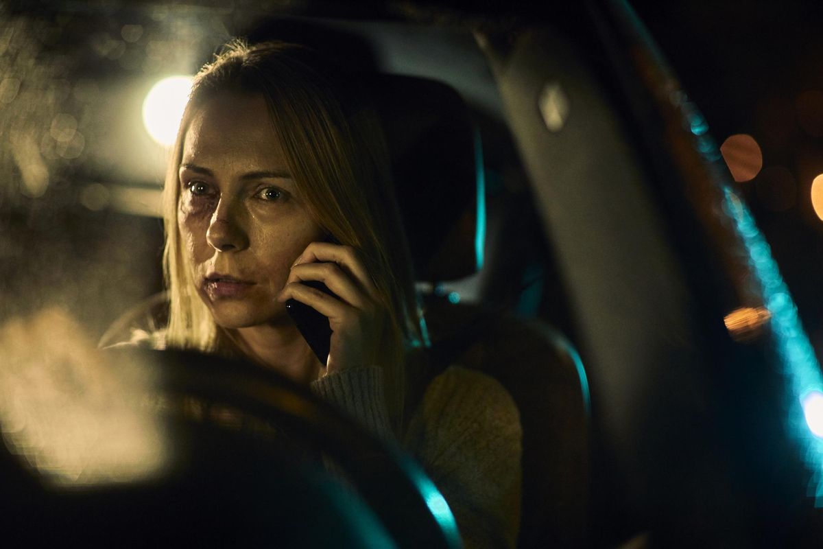 Injured woman talking on the phone