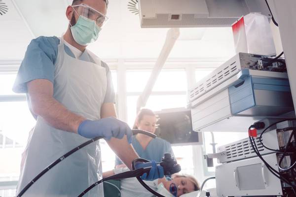 internist doctors during stomach examination