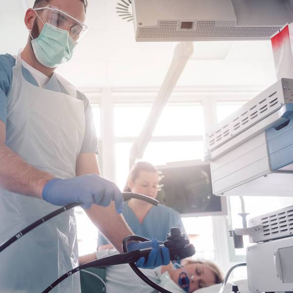 internist doctors during stomach examination