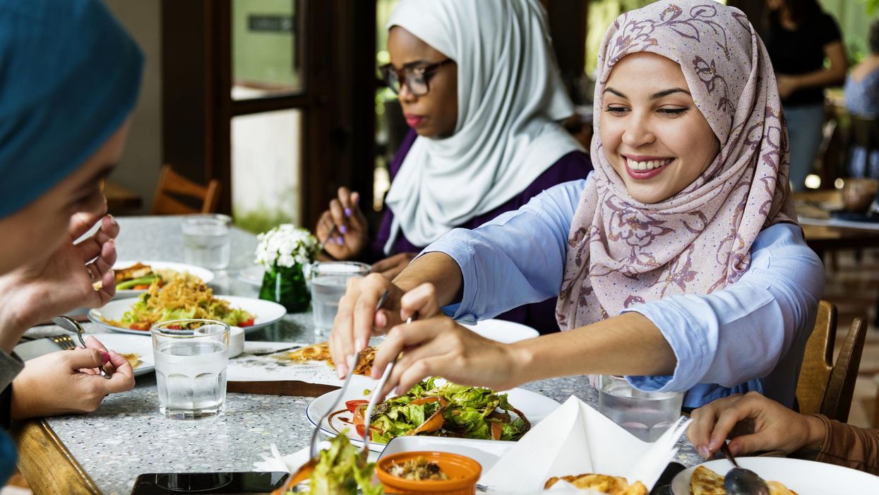 Islamic women friends dining together