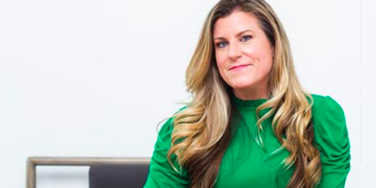 Jennifer Storm sitting on a chair