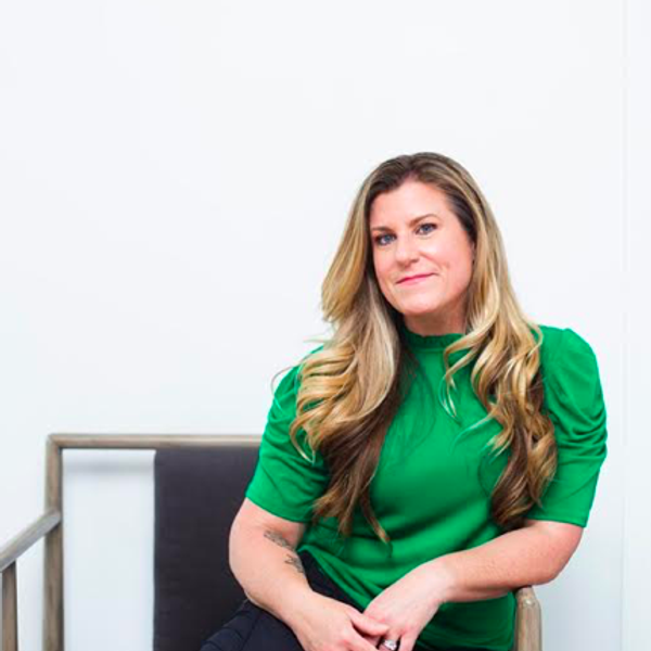 Jennifer Storm sitting on a chair