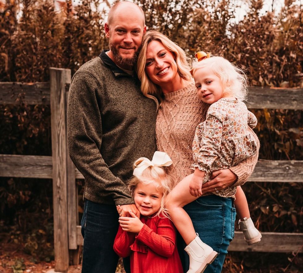 Kelly, with her husband and two daughters, 2024