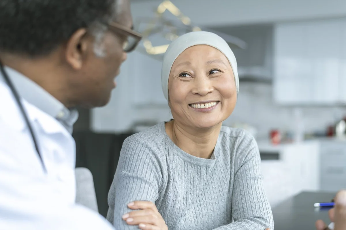 Korean woman with cancer is meeting with her doctor