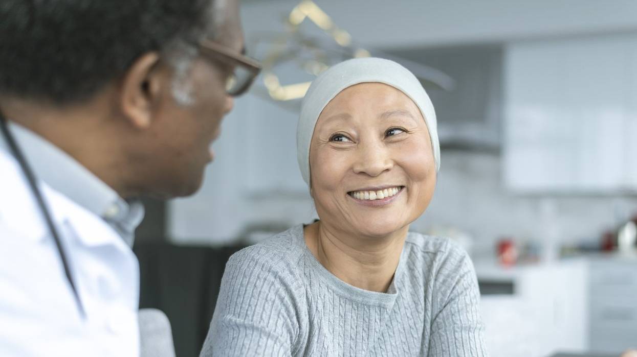 Korean woman with cancer is meeting with her doctor