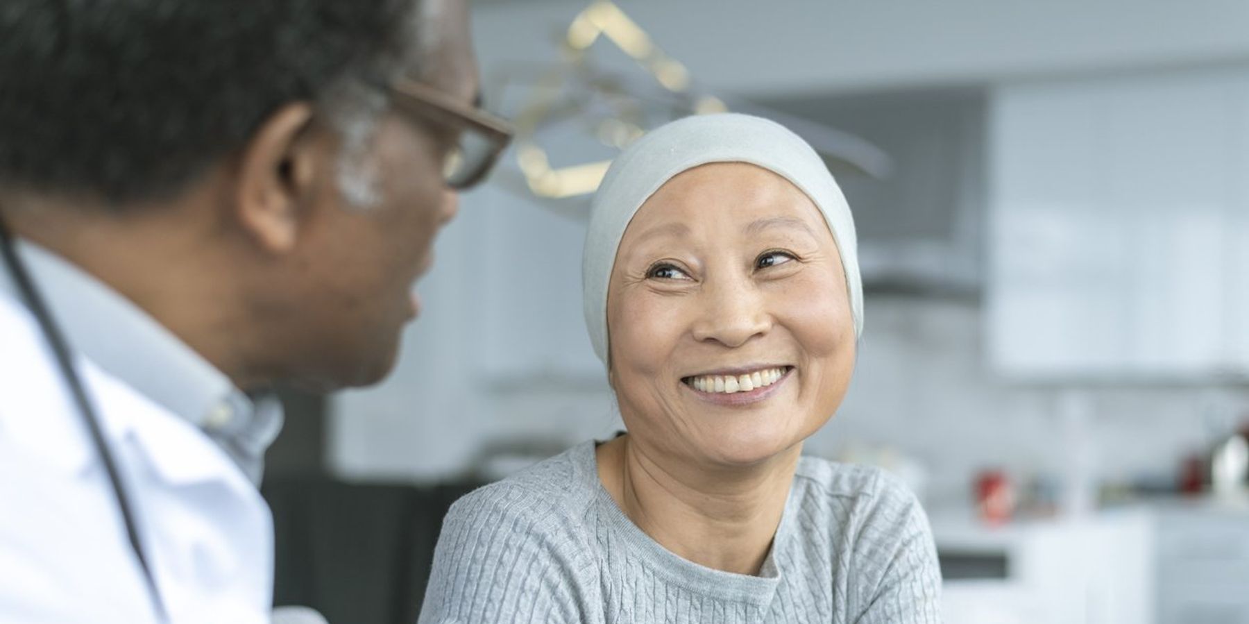 Korean woman with cancer is meeting with her doctor