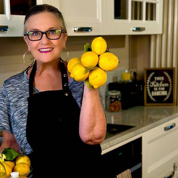 Linda holding lemons