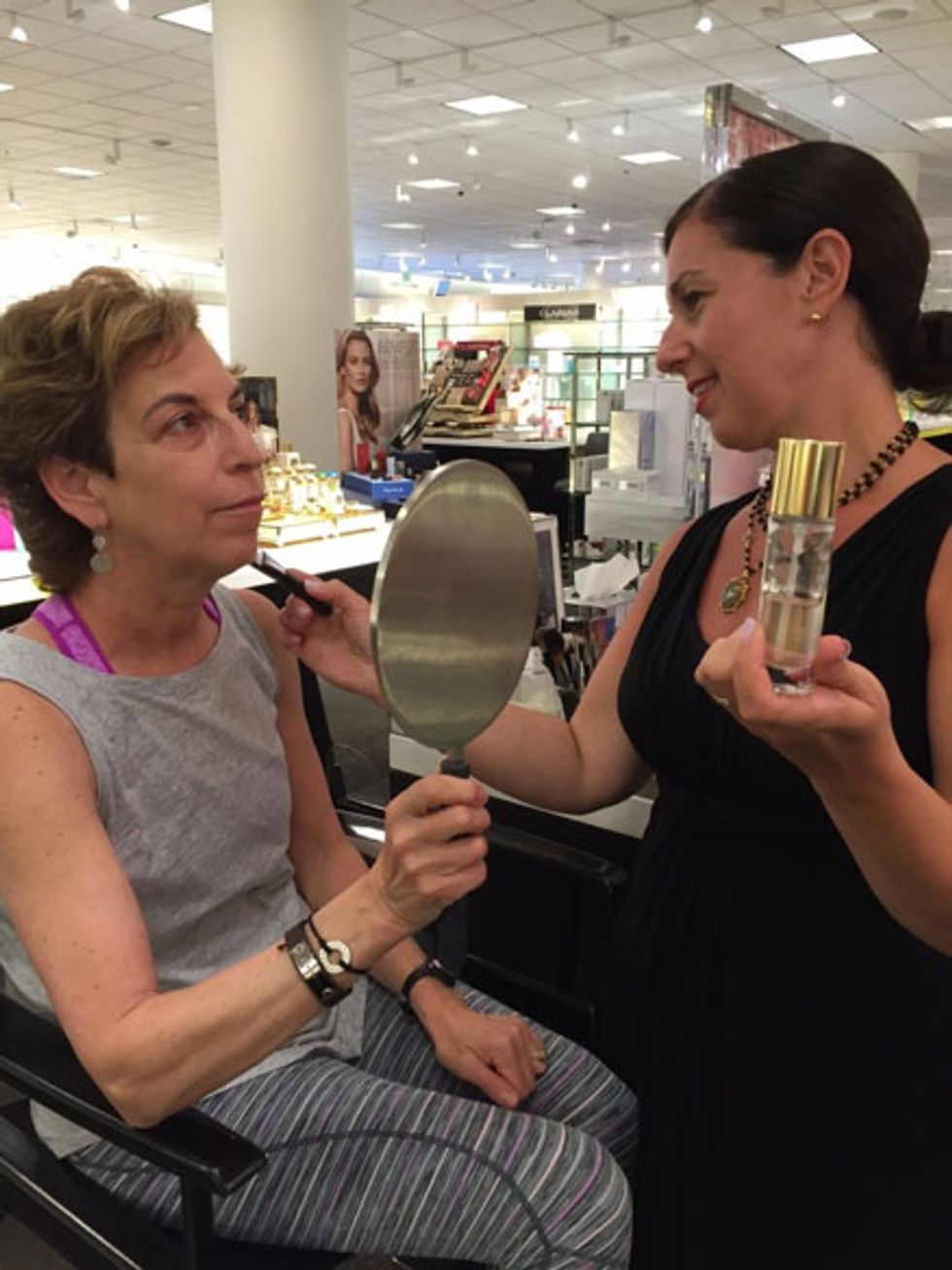 Lorraine applied bronzer in a sweeping motion along the sides of my face.