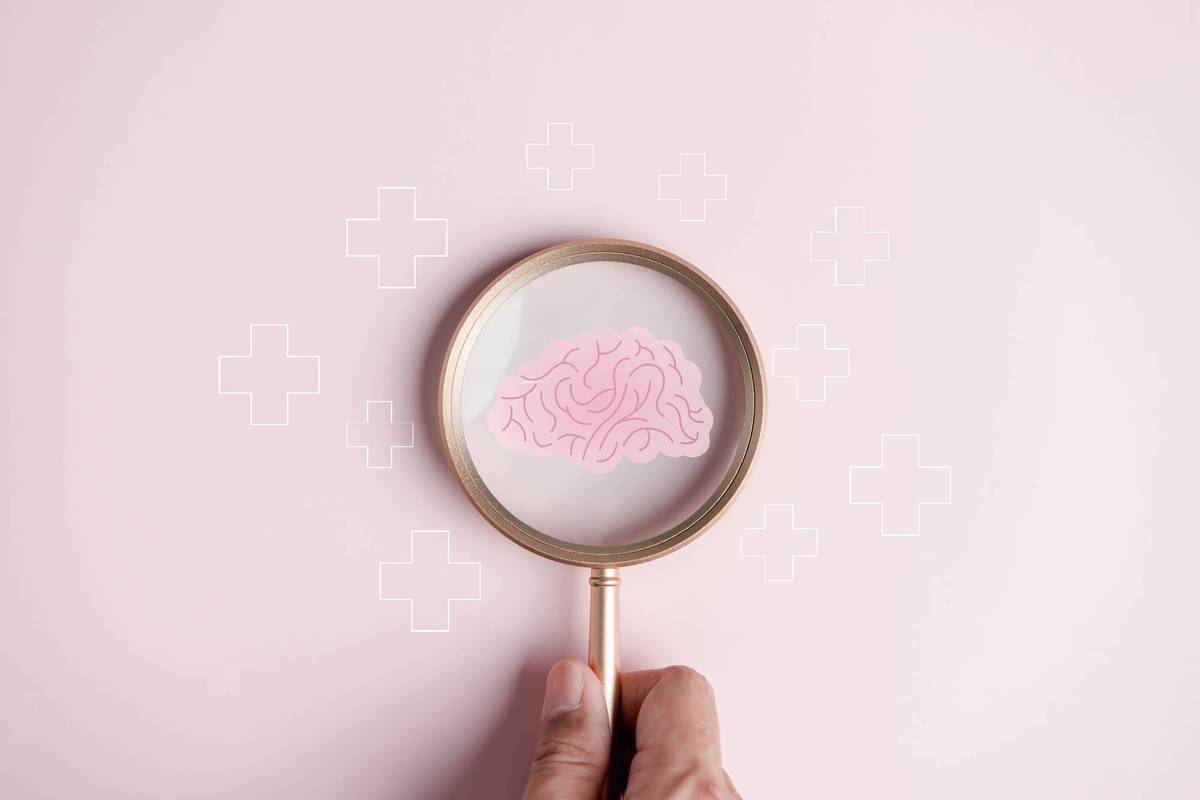 Magnifier focus to human brain icon
