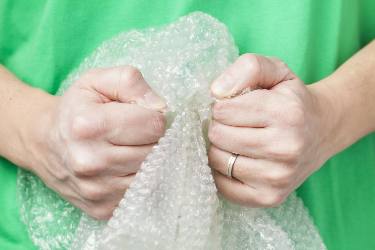 Man holding bubble wrap