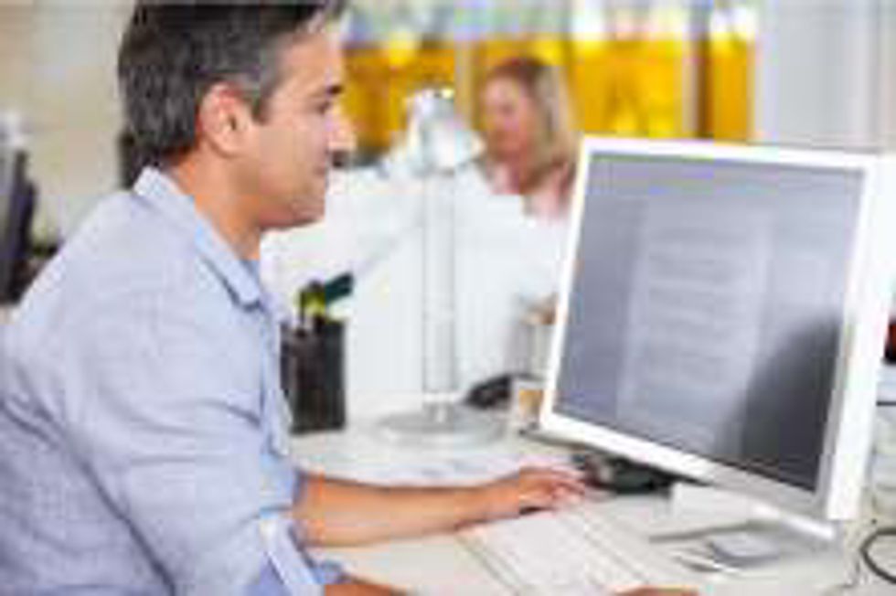 man working at a computer