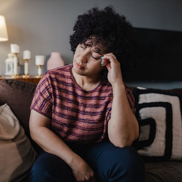 mature woman at home, suffering from chronic fatigue syndrome