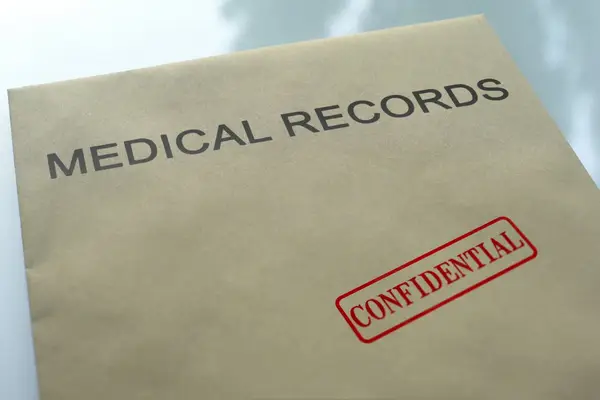 Medical records confidential, seal stamped on folder with important documents