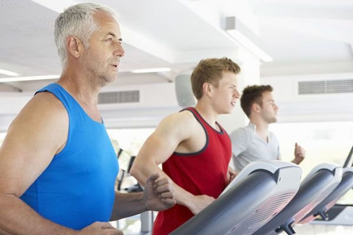 men running on treadmills