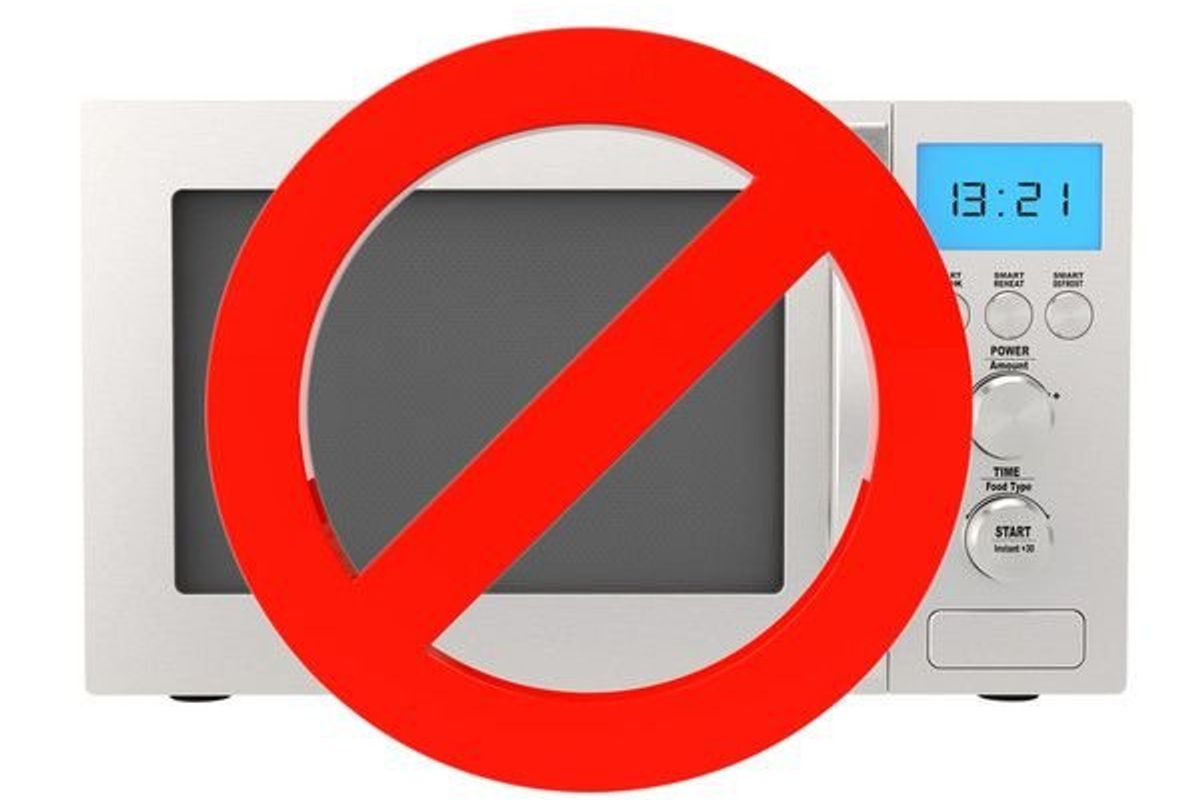 microwave with a red no sign on it